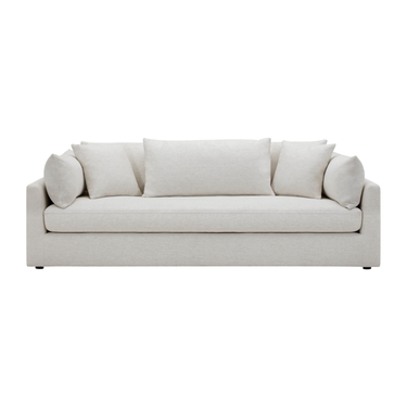 Beige sofa with cushions on a white background